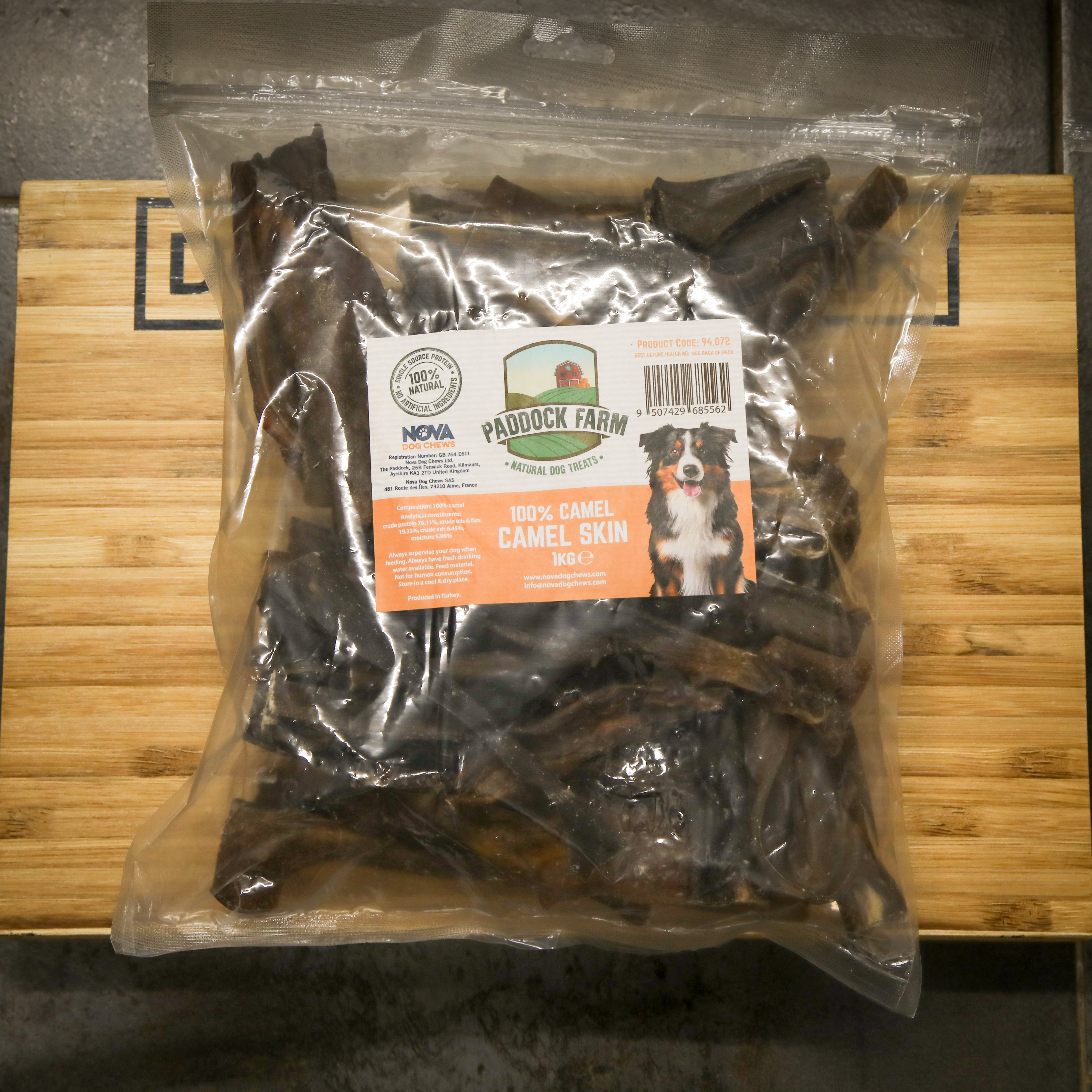 Package of Paddock Farm camel skin treats on a wooden surface