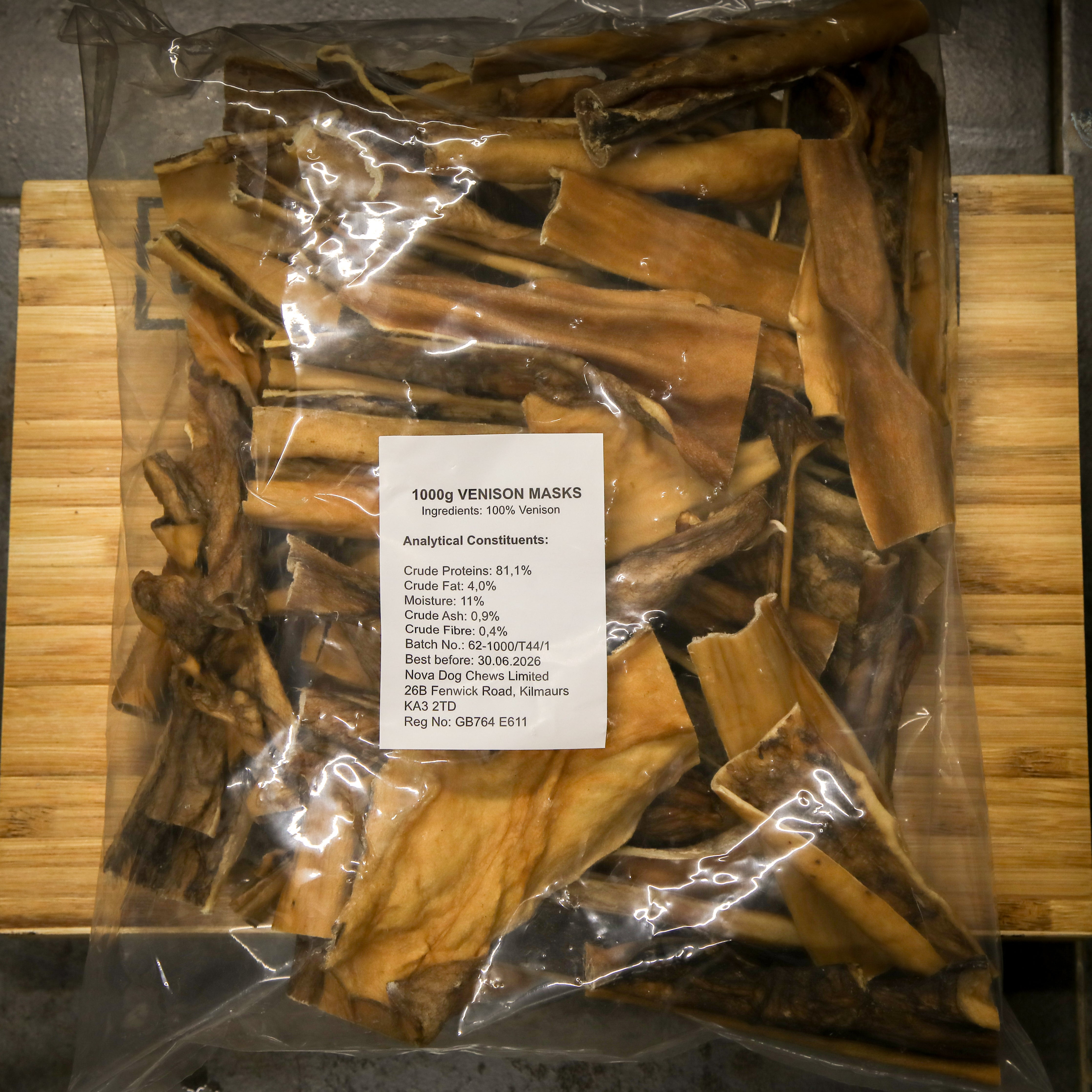 1kg bulk bag of natural air-dried Venison Mask skin dog treats showing long-lasting fibrous chews