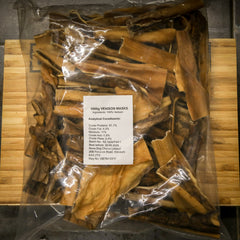 1kg bulk bag of natural air-dried Venison Mask skin dog treats showing long-lasting fibrous chews