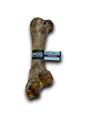 Ostrich bone with anco naturals label on a white background